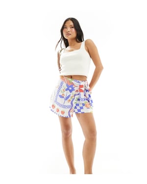 ASOS DESIGN Petite wrapdetalj skort i mosaikfruktsprint