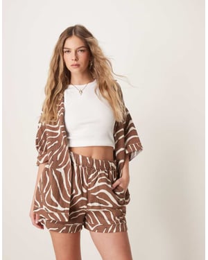 ASOS DESIGN cheesecloth pull on shorts with raw edge detail co-ord in zebra print