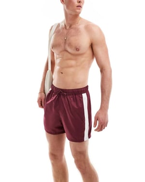 ASOS DESIGN korta badshorts med kontrastpaneler i vinröd