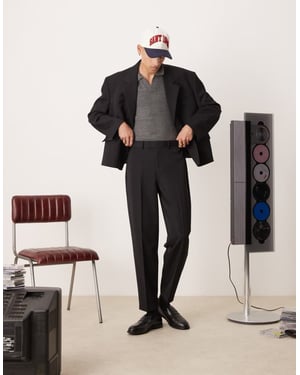 ASOS DESIGN oversized tapered suit trousers in black