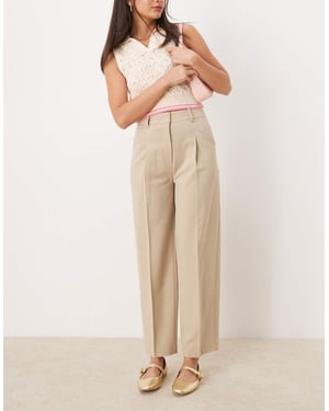 ASOS DESIGN tailored tapered trousers in stone
