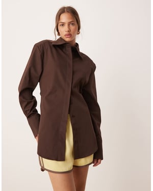ASOS DESIGN cinch shoulder pad shirt with tie back in chocolate