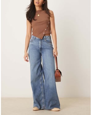 ASOS DESIGN wide leg jean in midwash blue - MBLUE