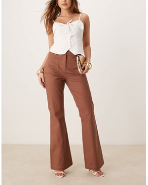 ASOS DESIGN patch pocket flare trousers in apricot