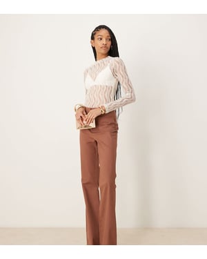 ASOS DESIGN Tall patch pocket flare trousers in apricot