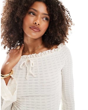 Miss Selfridge flare long sleeve textured jersey top in cream