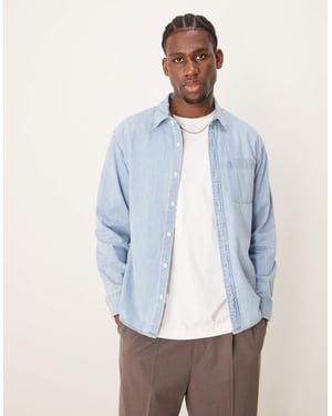 Abercrombie & Fitch long sleeve cropped western denim shirt in blue wash
