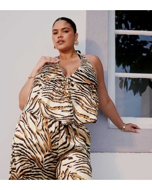 ASOS DESIGN Curve Gia satin wrap top in animal print