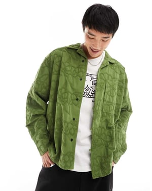 ASOS DESIGN boxy oversized skjorta med upp-och-nedvikta krage i broderad khaki-grön