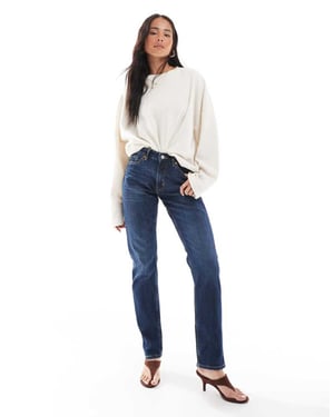 Monki Ako mid waist slim fit jeans i havsblå