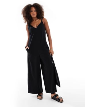 ASOS DESIGN Twist shoulder jumpsuit in black