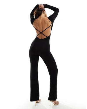 ASOS DESIGN långärmad jumpsuit med utsvängda ben, öppen rygg och banddetaljer i svart