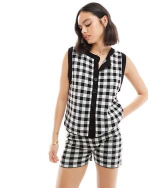 ASOS DESIGN oversized rutiga väst i svart