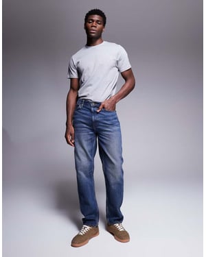 ASOS DESIGN raka jeans med vintagefärg i mörk tvättblå