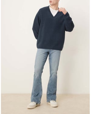 ASOS DESIGN stretch flare jeans i ljus tvättad blå