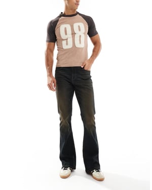 ASOS DESIGN stretch flare-jeans i svart med brun nyans