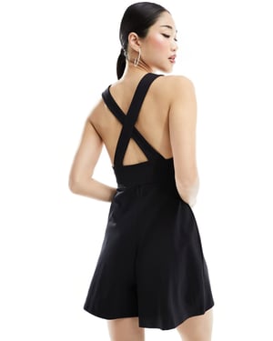 Redigerad korsrygg pinafore jumpsuit i svart
