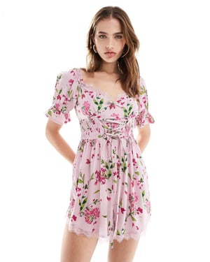 ASOS DESIGN korsettmidja mjölkpiga jumpsuit i rosa blommig
