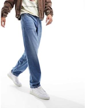 ASOS DESIGN baggy jeans i autentisk vintage tvätt i medelblå tvätt