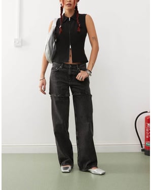 Weekday Ample lågt midjade löst sittande jeans med öppen detalj i svart band