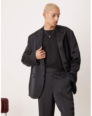 ASOS DESIGN avslappnad oversized kostymjacka i svart satin