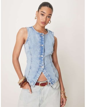 Gina Tricot sleeveless sculpted denim waistcoat in lightwash blue