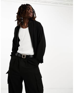 ASOS DESIGN oversized samordnad bomberjacka i svart