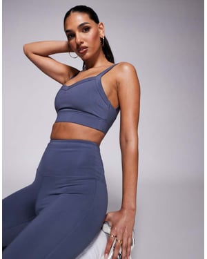 4505 Icon active medium support sports bra with removable padding and adjustable straps in cornflower