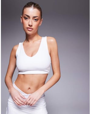 4505 v neck racer back medium support sports bra in white