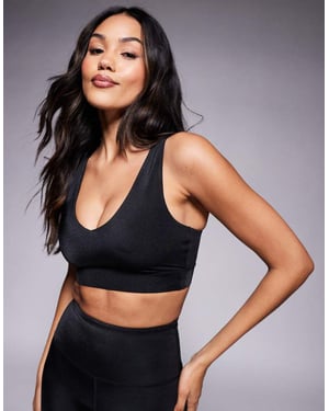 4505 Fuller bust medium support sports bra with adjustable straps in black high shine