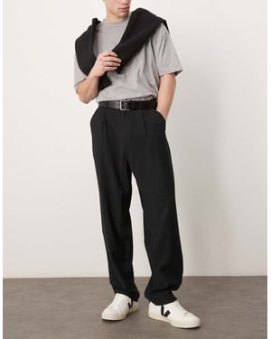 ASOS DESIGN löst sittande skaterbyxor i svart