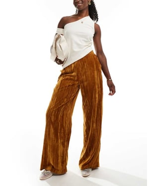 ASOS DESIGN crinkle velvet pull on trouser in gold