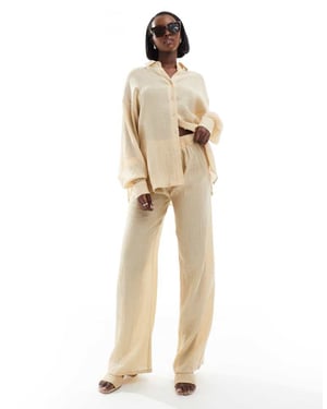 In The Style x Georgia Louise strukturerade vida byxor set i beige