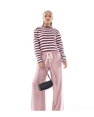ASOS DESIGN Petite pull on trousers with contrast panel in pink