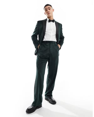 ASOS DESIGN byxorna i sammetsmaterial med vida ben i grön tuxedosuit