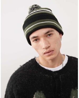 Weekday skater pomponmössa i khaki och svart rand