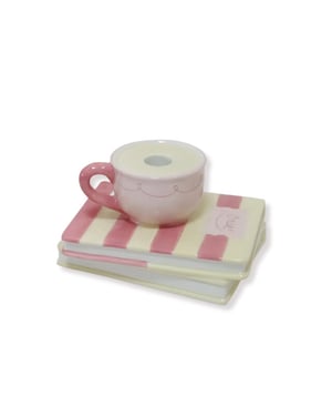 House Vitamin Candle holder cup on pile of books yellow/pink dolomite 16,5x13,5x9,5cm