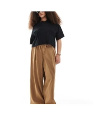 ASOS DESIGN Curve soft wide leg trouser in washed caramel