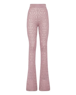Utsvängda byxor med monogrammönster