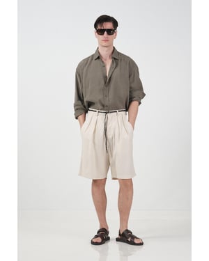 Högmidjade vida Tencel-byxor