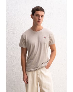 Randig rundhalsad t-shirt med broderi