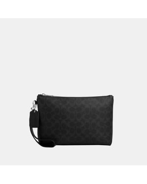 Pouch In Signature Canvas