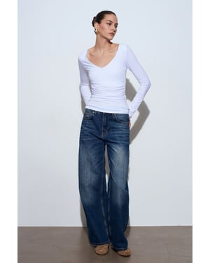 Slim Fit V-ringad stickad blus