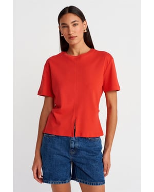 Dam T-shirt i bomull med rund hals och slitsar