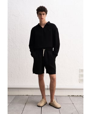 Herrars avslappnade passform texturerade bomullsshorts med dragsko