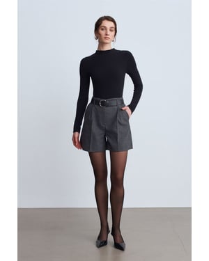 Högmidjade midjebältade vida skräddarsydda shorts
