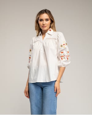 Blouse met lantaarnmouwen, geborduurde bloemen en een ajourdetail