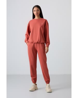 Oversized Sweatshirt en Elastische Boordbroek Set