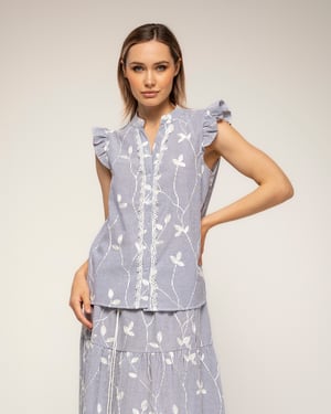 Gestreepte blouse met borduursels en kantdetail met ruches aan de mouwen