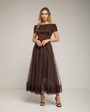 Tule midi-rok met kant aan de onderkant en strikdetails.